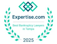 Attorney Mike Ziegler and Kaelyn Diamond discussing debt defense strategies in their Clearwater Florida office